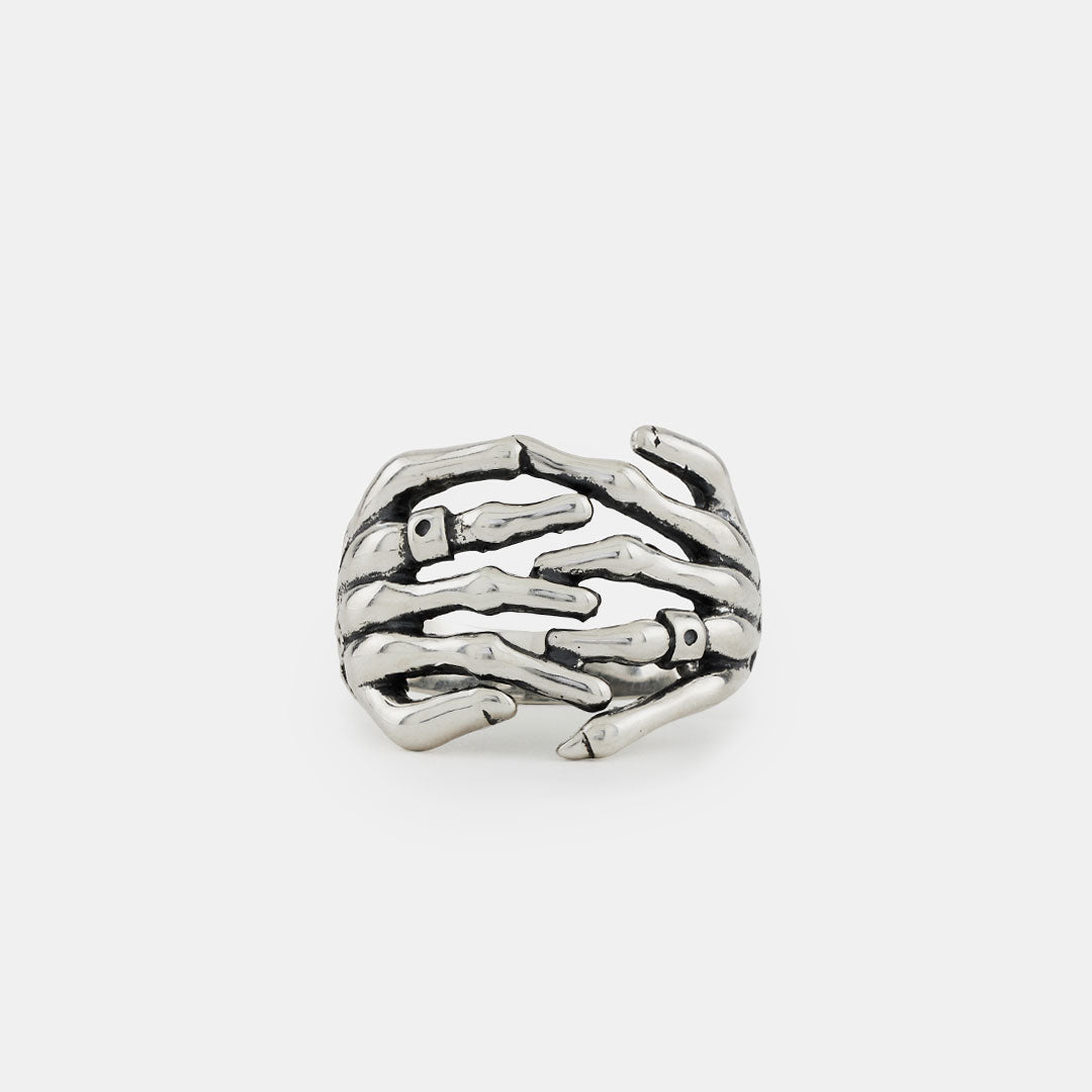Silver-Skeleton-Hands-Ring-product-Shot-grey_3ce2325c-8639-4618-a322-86bd992b565d.jpg